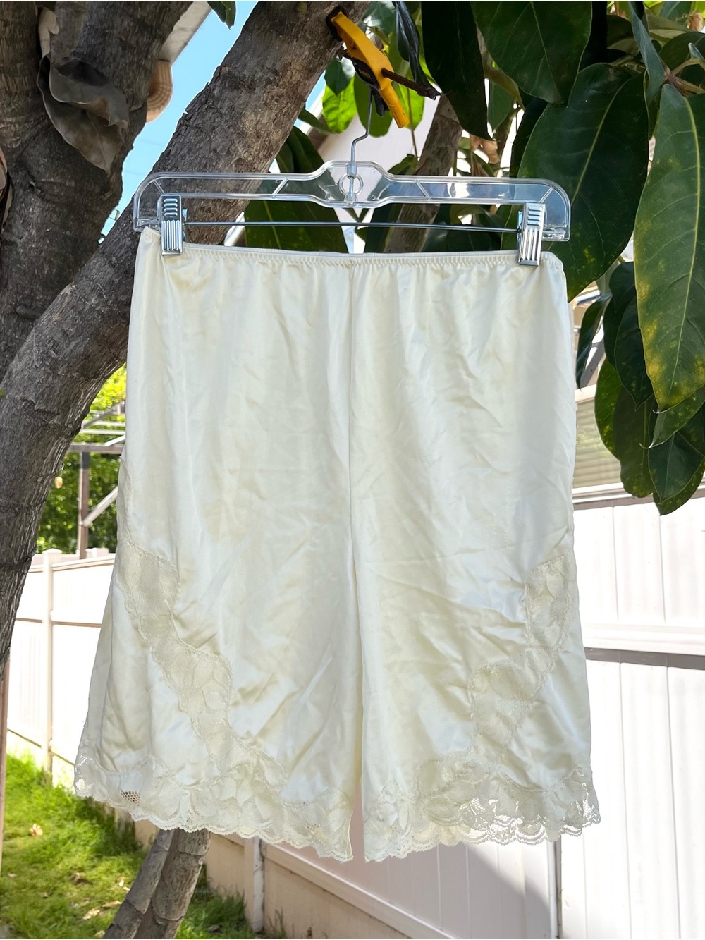 Vintage Hers Light Yellow Slip Shorts with Lace Detailing.